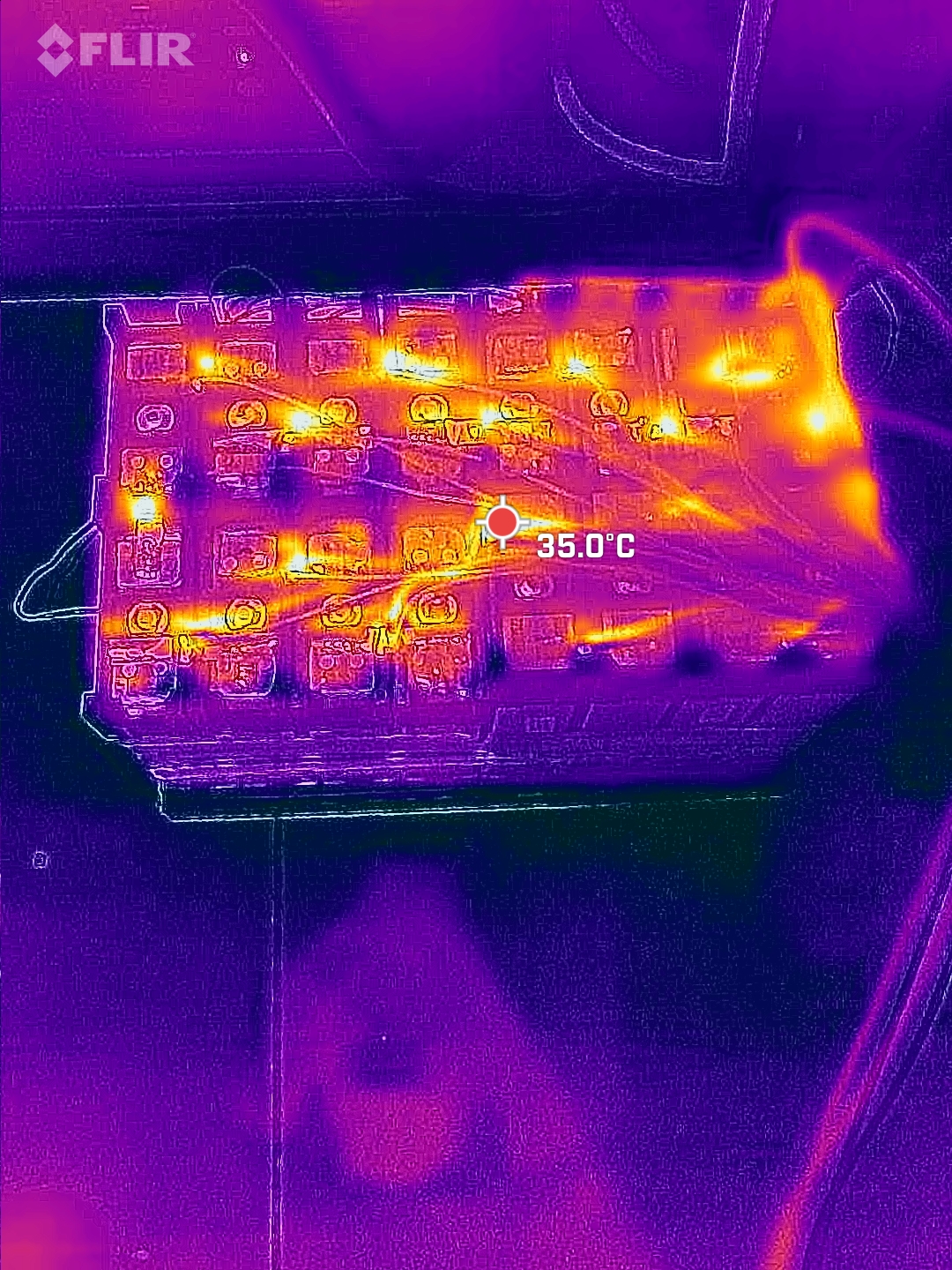 Thermal camera view of a solar battery pack and BMS wiring